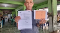 pedagang-pasar-raya-padang-keluhkan-tak-dapat-toko-meski-miliki-kartu-kuning