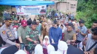 bupati-dharmasraya-dan-tni-resmikan-jembatan-aramco-lubuk-karak