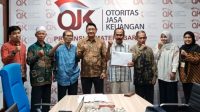 perkuat-modal-dan-dukung-umkm,-ojk-resmi-restui-penggabungan-bpr-ophir-ke-bpr-swadaya-anak-nagari