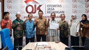 perkuat-modal-dan-dukung-umkm,-ojk-resmi-restui-penggabungan-bpr-ophir-ke-bpr-swadaya-anak-nagari