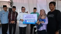 jamin-akses-kesehatan,-pemkab-tanah-datar-salurkan-bantuan-dana-pengobatan jamin-akses-kesehatan,-pemkab-tanah-datar-salurkan-bantuan-dana-pengobatan