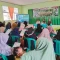 buka-peluang-pengabdian,-satgas-tmmd-ke-129-gelar-sosialisasi-rekrutmen-prajurit-tni-di-buluh-kasok
