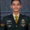 Serda Arifin Ilham saat upacara pelantikan Bintara TNI AD di Rindam I/Bukit Barisan, Pematangsiantar.